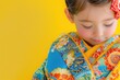 © Alla - A young Japanese girl dressed in a vibrant kimono, ready for a celebration or cultural event