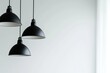 © Elena - Modern minimalist black hanging lamps in the interior of a home or office, close-up. Copy space, free space for text