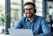 © Pixel Focus AI - Confident Man with Headset Working on Laptop in Office looking at camera