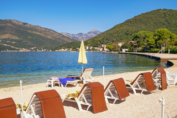 Wall Mural - Beautiful Mediterranean landscape. Autumn beach vacation. Montenegro, Adriatic Sea. Bay of Kotor near Tivat city