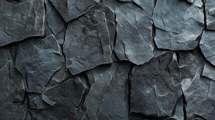 Poster - A close-up of a textured slate stone wall, showcasing dark shades and natural patterns.