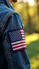 large usa flag patch on denim jacket sleeve in sunny blooming nature
