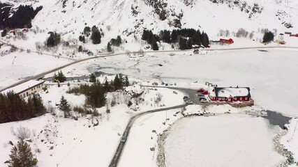 Wall Mural - 4k drone flight back footage (ultra high definition) of kongsjordpollen fjord, vestvagoy, norway. wi