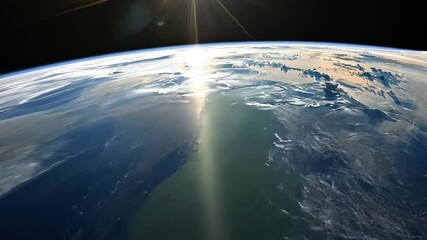 Canvas Print - the earth from space, with a blue sky and clouds. the sun is shining brightly, creating a warm and i