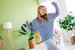 © deagreez - Photo of nice blonde young girl have fun dancing wear striped clothes enjoy modern cozy interior flat indoors