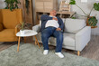 © Pixel-Shot - Senior man having heart attack at home