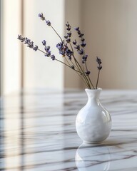 Poster - Elegant display of a pristine white ceramic vase with single lavender stem set on marble surface in a soft clean background for home decor inspiration