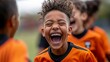 © Alex - Joyful young football player celebrating with teammates