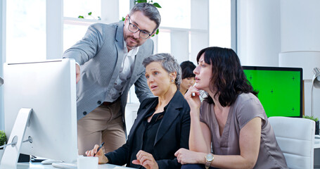 Poster - Computer, feedback and pointing with business people in office together for collaboration or training. Coaching, management or teaching with professional employee group in workplace for development
