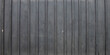 © OceanProd - Wood grey line facade wooden facade fence wall background vertical plank
