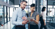 © peopleimages.com - Teamwork, tablet and business people in office, internet and connection with online schedule. Employees, coworkers and consulting agency for insurance, technology or company website with digital app
