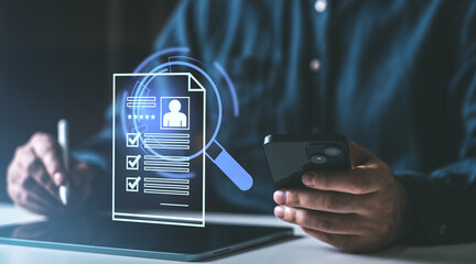 Poster - digital recruitment process concept showing a person holding a mobile device and stylus with a float