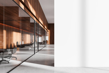 Poster - modern office space with glass walls, wooden accents, and empty white wall for mockup or design temp