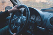 © Artvibe - car driver driving a steering wheel.