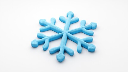 Poster - A blue snowflake made of a soft material, showcasing a playful winter design.