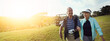 © peopleimages.com - Golf, hobby and retirement with senior couple outdoor on course together for leisure activity. Grass, love and mockup space with old people playing sports for bonding or recreation in summer