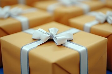 Many gift boxes with beige wrapping paper and white ribbons.