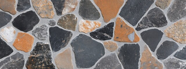 Poster - A textured surface of various stones in earthy tones arranged in a mosaic pattern.