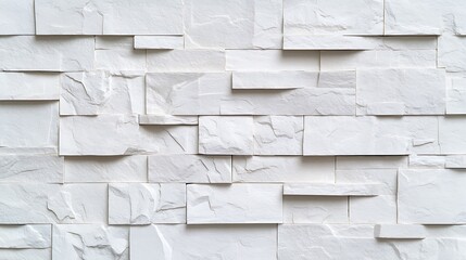 Poster - Textured white wall composed of rectangular stone panels, showcasing a modern and clean design ideal for interior decoration and architecture projects.