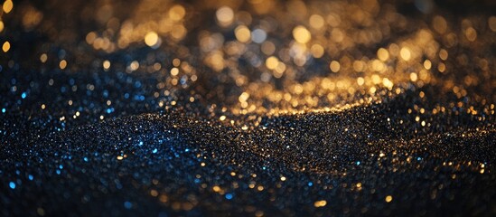 Poster - Abstract shimmering glitter backdrop in gold black and blue tones with a festive holiday theme ideal for celebrations or party invitations
