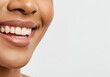 © Jenny - Close-up of smiling woman's face highlighting white teeth and smooth skin