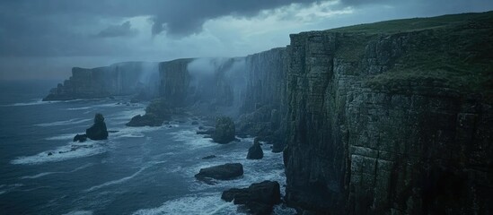 Poster - Majestic coastal cliffs with turbulent ocean waves beneath a dramatic cloudy evening sky