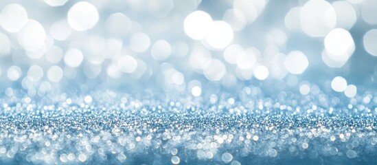 Leinwandbilder - Sparkling blue backdrop with shimmering glitter effect creating a dreamy motion background for festive or winter-themed visuals