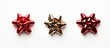 © -Quantum Pixels- - Three colorful gift bows in red and gold neatly arranged on a clean white background for festive decoration and gift wrapping concepts.