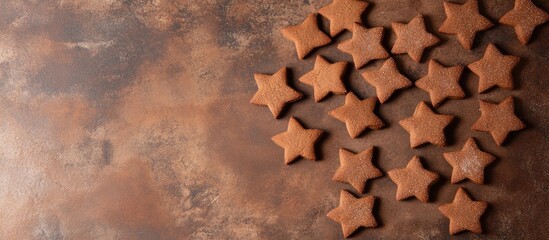 Poster - Cinnamon star cookies arranged on a rustic surface with empty space for text ideal for festive food promotions or holiday-themed designs