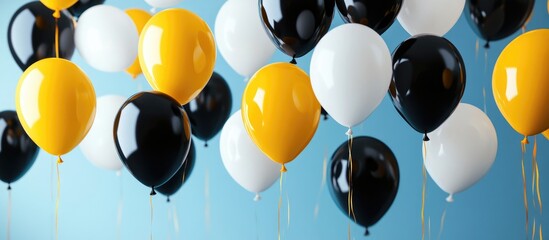 Poster - Colorful helium balloons in black, yellow, and white floating against a blue background for festive celebration and event decoration ideas