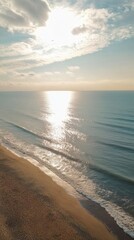 Poster - The ocean is calm and the sun is shining on the water