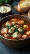 © Vladimir - Delicious seafood soup garnished with parsley.