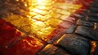 Warm sunset light illuminates a wet cobblestone street, creating a vibrant display of red and gold hues. The textured surface shimmers with reflected light.