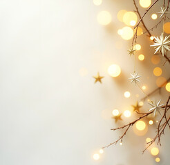 Wall Mural - christmas background with a tree branch, golden stars and bokeh on a light background. copy space on