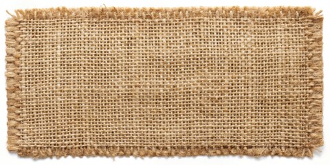 Poster - A close-up view of the rough texture of natural brown burlap fabric with frayed edges, showing a woven pattern of natural fibers.