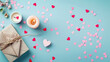 © Mahemud - Valentine's Day background featuring pink hearts on a pastel pink backdrop. A simple yet elegant flat lay design with top view and ample copy space.