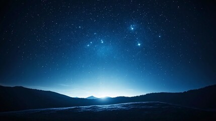 starry night sky over mountains