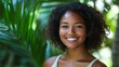 © WS Studio 1985 - Young Smiling African American Woman Against Tropical Background