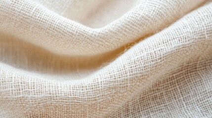 Poster - Close-up of textured, light-colored fabric with soft folds.