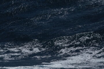 Wall Mural - dark ocean waves create dramatic and powerful scene, showcasing beauty of nature force. contrast of 