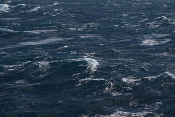 Wall Mural - dark ocean waves create dramatic and powerful seascape, showcasing beauty of nature force