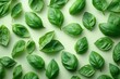 © julija - fresh, vibrant green basil leaves arranged artistically on a pure white background, showcasing their rich texture and vivid color in a clean and minimal composition
