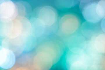 Wall Mural - soft bokeh lights creating a dreamy atmosphere on a clear blue background