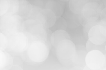 Wall Mural - soft white bokeh lights creating a dreamy atmosphere in a light background