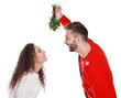 © New Africa - Lovely couple under mistletoe bunch on white background