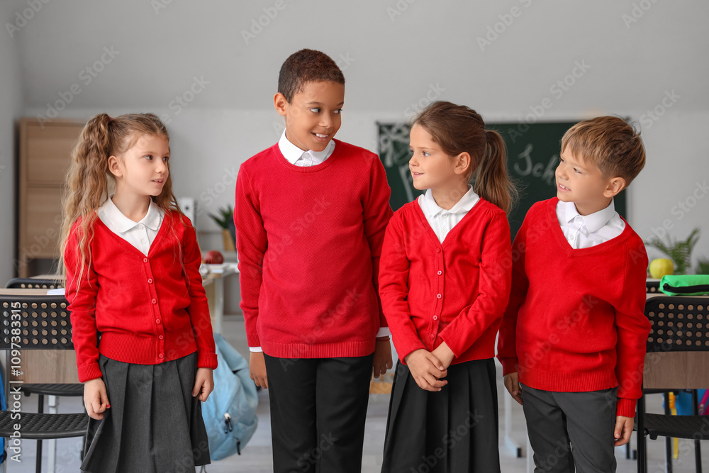 Portrait of little pupils in classroom