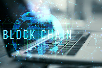 Leinwandbilder - Blockchain text over digital globe and laptop keyboard, symbolizing global technology and crypto network concept.