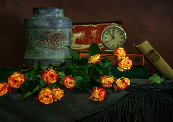 Canvas Print - Still life with a bouquet of roses, a ceramic vase, a clock and books.