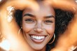 © Milana - Happy Black Woman Smiling Outdoors in Heart-Shaped Leaves - Beautiful Young Woman Promoting Self Love and Wellness