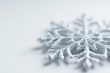 Wall Mural - close-up of sparkling snowflake on soft background